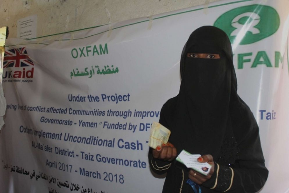 Una mamma aiutata dall'Oxfam  (Oxfam - Zeyad Ghanem)