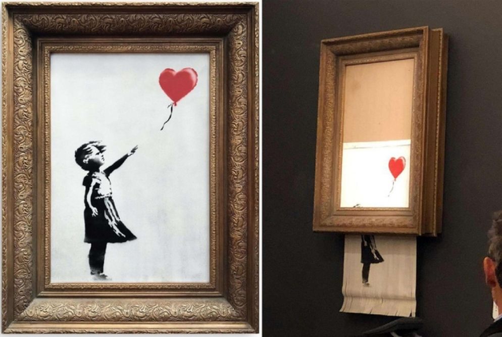 L’opera di Banksy mentre si autodistrugge