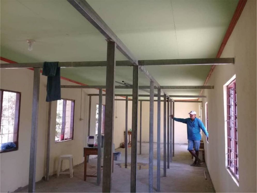 I lavori per la costruzione dell'infermeria dell'orfanotrofio di Laga - Fondazione Opera don Bosco