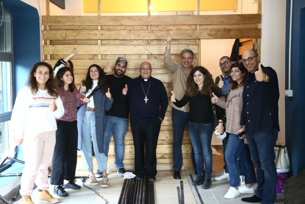 I giovani cattolici di rito latino in Libano impegnati nella costruzione del centro di comunità a Beirut che aiuterà le famiglie cattoliche - Fondazione Giovanni Paolo II
