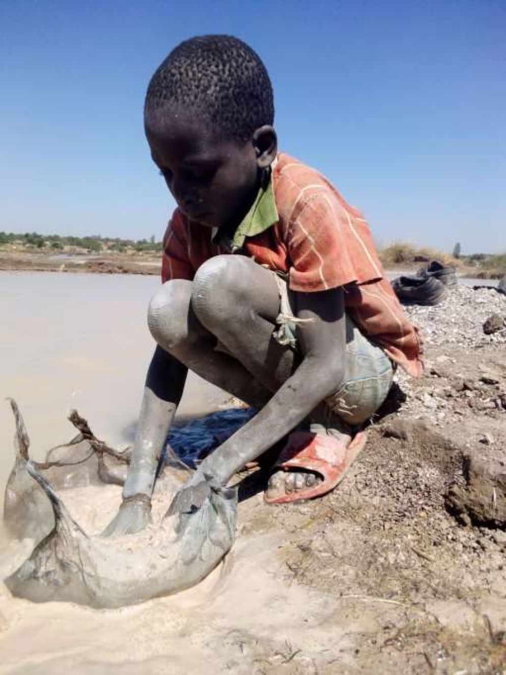 Baby minatore nel sud.est del Congo - Still I rise