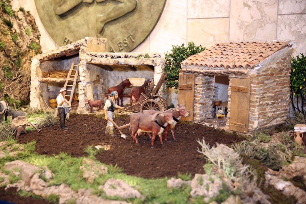 Scene di vita quotidiana in un presepe - Imagoeconomica